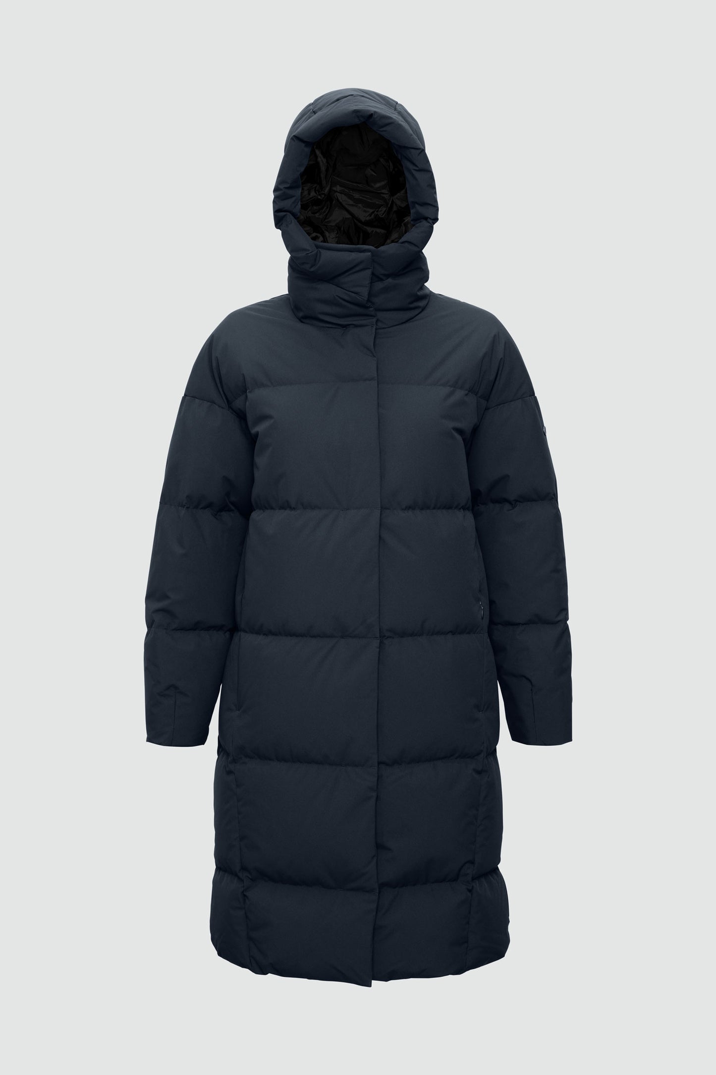 Black puffer coat with a hood on a light gray background