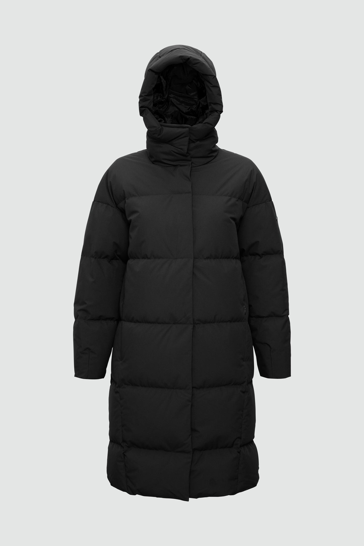 Black puffer coat with a hood on a light gray background